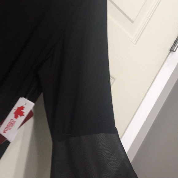 Women’s size Large mid length black dress with long bell sleeves and V neck - Picture 3 of 7